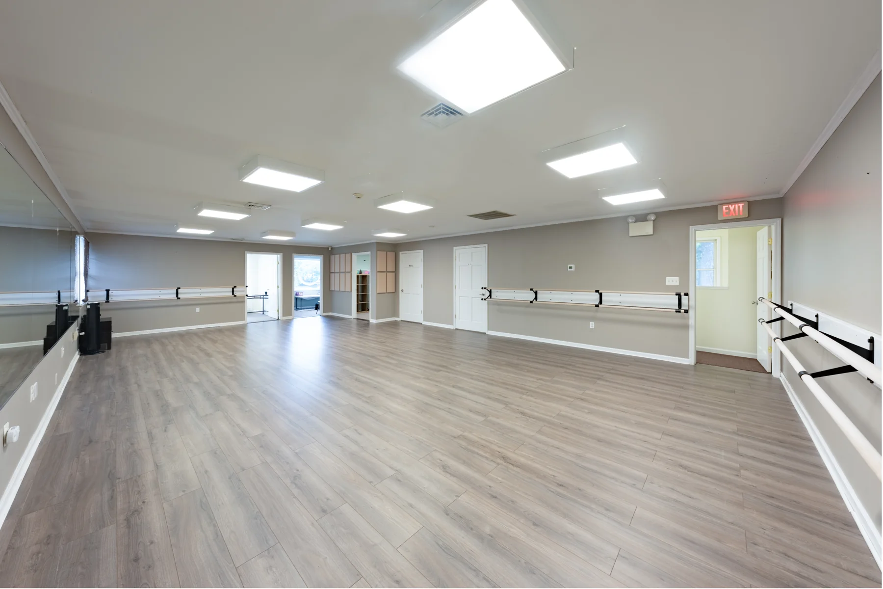Mirrors and barres lining the Dance with Joy studio